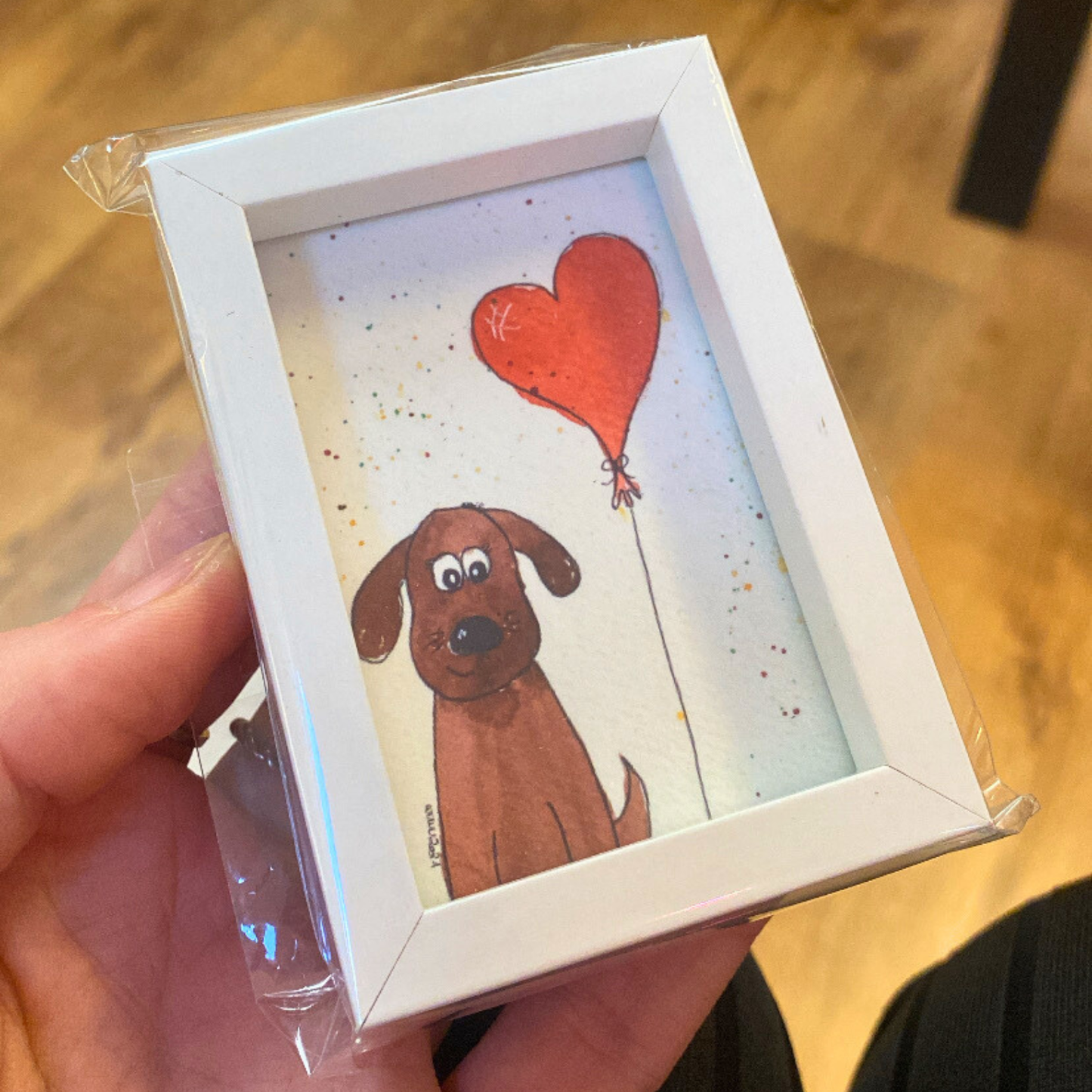 Hundi mit Herzballon - Gute Laune Minibild von Wuwu
