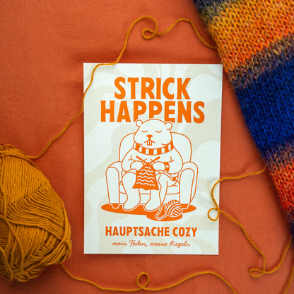 Murmeltierkarte sitzt auf einem Sessel und strickt einen Schal